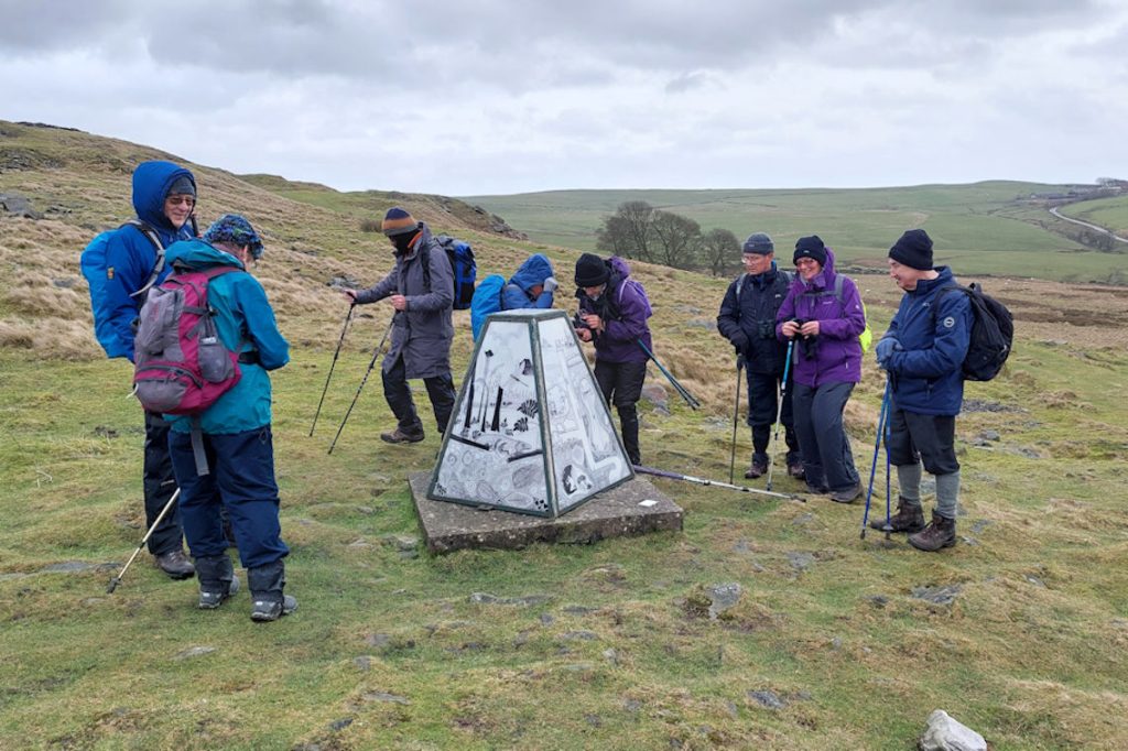 The C group admiring Coal Mining Trig Point at Andrew's Knob